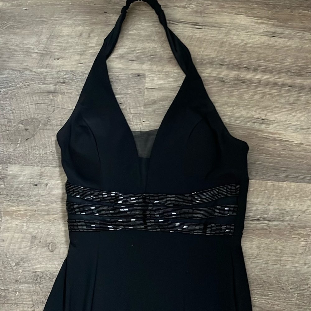 Beautiful black full length dress.  Beaded waist.  Tulle detail